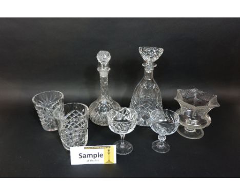 A large collection of various glassware to include various decanters, fruit bowls, goblets, etc (a shelf full)