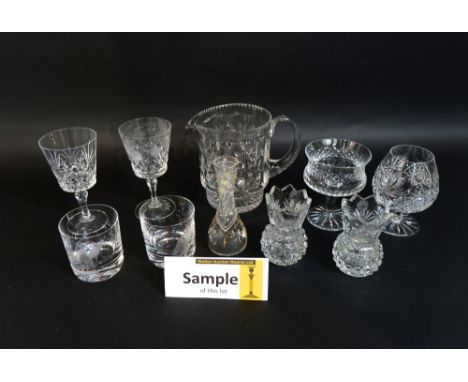 A collection of various etched cut coloured and other glassware to include a cylindrical decanter etched with fern leaves, va