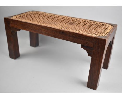 A Small Rectangular Rosewood Framed Stool with Caned Top, 45.5cms Wide 