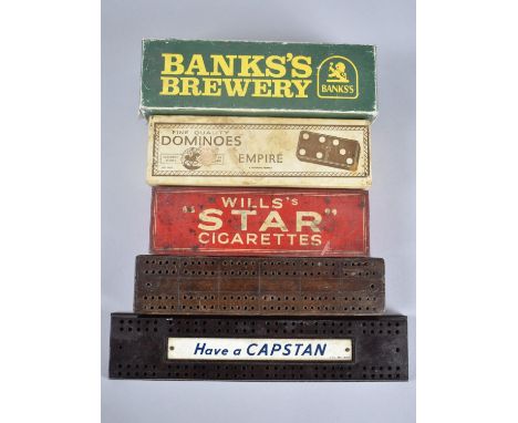 A Collection of Two Vintage Cribbage Boards and Three Boxed Sets of Advertising Dominoes 