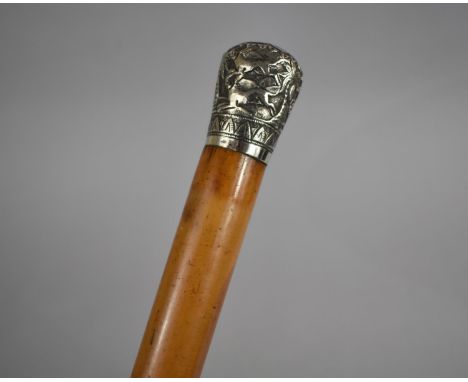 A Colonial Malacca Walking Cane with White Metal Top Decorated with Palm Trees and Hunting Dogs 