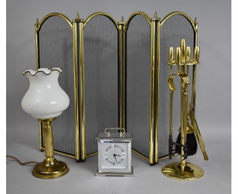 A Brass Farmed Fire Guard together with Companion Set, Brass Reeded Column Table Lamp with Glass Shade and a London Clock Man