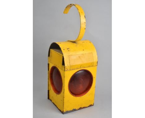 A Mid 20th Century Yellow Painted Road Lamp 
