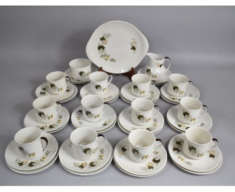 A Royal Doulton Westwood Pattern Service to comprise Twelve Cups, Saucers and Side Plates, Cake Plate Milk Jug and Sugar Bowl