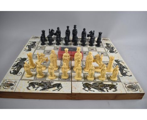 A Mid/Late 20th Century Folding Chess and Bagatelle Board Containing Plastic Chess Pieces and Draughts, 47cms Square 