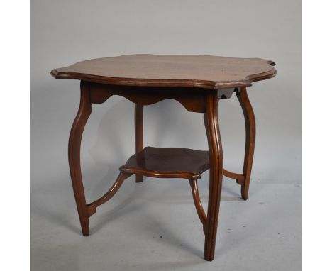 An Edwardian Mahogany Occasional Table with Stretcher Shelf, Cut Down 