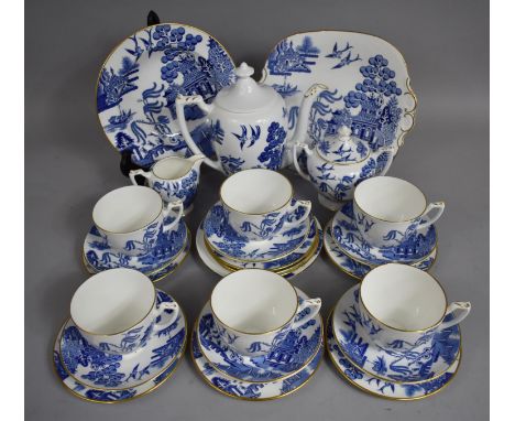 A Coalport Willow Pattern Tea Set to comprise Six Cups and Saucers, Eight Side Plates, Cake Plate, tea pot, Sugar Pot and a M