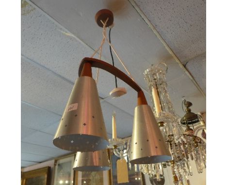 A three branch hanging ceiling lamp, with conical shades