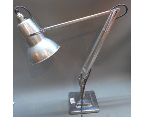 A Herbert Terry chrome anglepoise lamp, on stepped square base