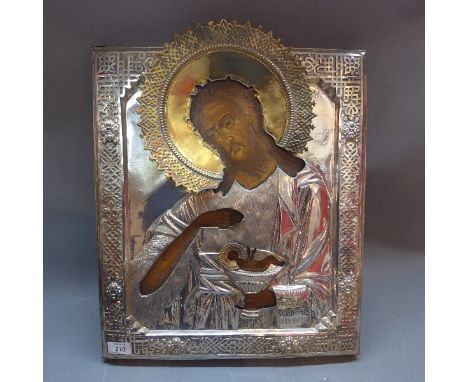 A Russian white metal icon, depicting a Saint with white metal oklad and painted wooden panel. H-53cm, W-44cm 