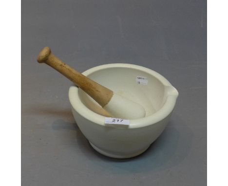 A vintage stone pestle and morter