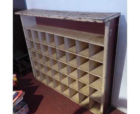 A vintage steel Post Office pigeon hole cabinet having forty shelves, H:106cm W:123cm D:28cm