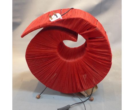 A Pierre Cardin table lamp of spiral form with red fabric covering a metal base, France 1950's. H-44cm 