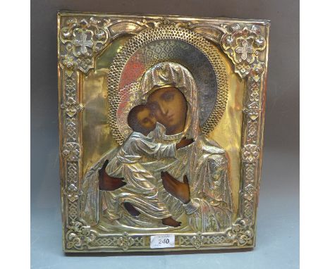 A Russian silver icon, depicting the Feodorovskaya mother of God, the silver oklad above a painted wooden panel, hallmarked t