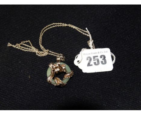     A Silver &amp; Jade Chinese Dragon Pendant On A Fine Link Chain                     