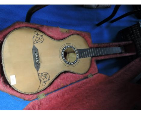 A 19th Century traditional parlour guitar, in wood case (af, incomplete , no labels)