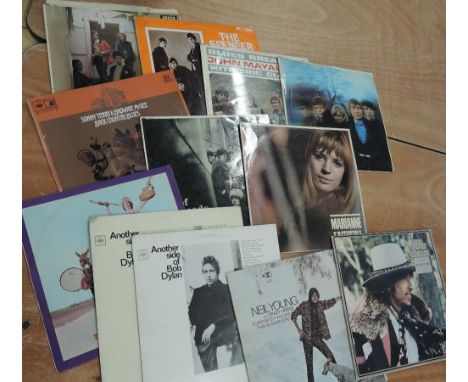 A twelve album lot with albums from the Rolling Stones, Marianne Faithful, Savoy Brown Blues band, John Mayall's Bluesbreaker