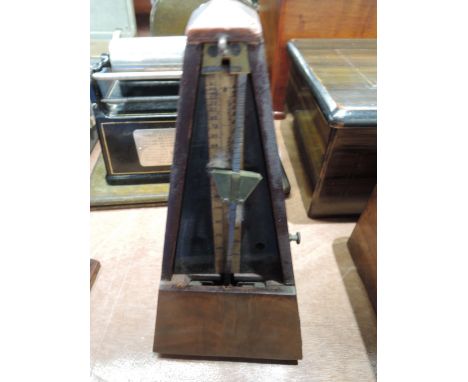 A late 19th/early 20th Century mahogany cased metronome, with brass label 'Maelzel's'Condition report - runs, not checked for