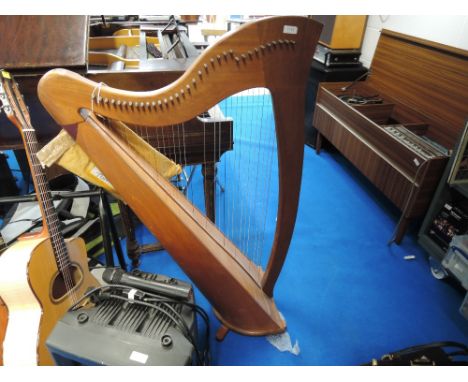 A traditional harp, approx 4' height