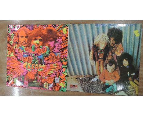 A lof of two albums - a nice UK Cream Stereo - Disraeli Gears and a rare Jimi Hendrix ' band of gypsy's ' puppet sleeve - Aus