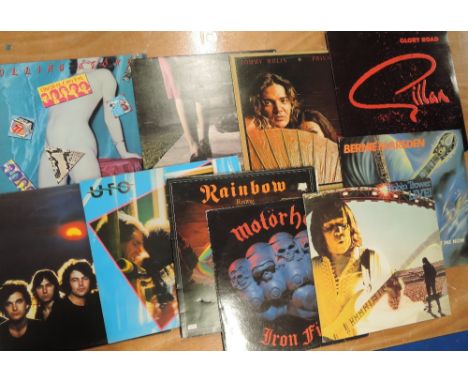 A lot of twenty two rock and metals with Rolling Stones , Ian Gillan Band , Motorhead and more , great shop stock