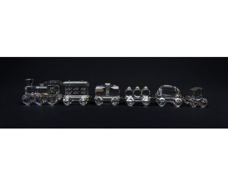 Swarovski crystal Train set comprising an engine and five interlocking carriages, all boxed with certificates  Condition Repo