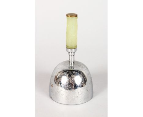 A CHINESE HAND BELL with carved jade handle. 10cms high.