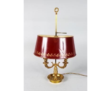 A 19th CENTURY STUDENT'S TOLE WARE LAMP with dolphin supports.