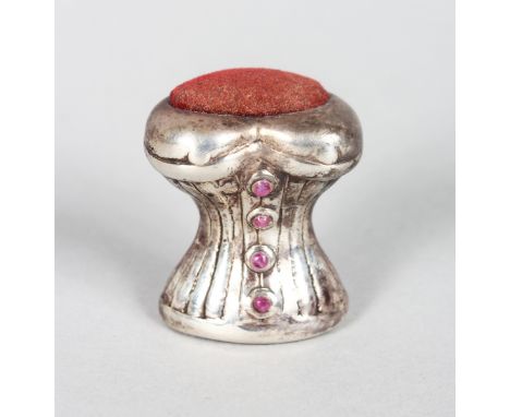 A NOVELTY SILVER  AND RUBY SET BASQUE PIN CUSHION.