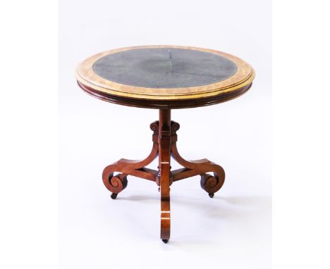 A MID 19th CENTURY MAHOGANY CIRCULAR TOP TRIPOD TABLE, the top inset with a leather panel, supported on curving legs with cas