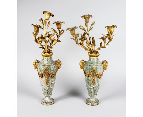A SUPERB PAIR OF LOUIS XVIth DESIGN MARBLE AND ORMOLU THREE LIGHT CANDELABRA with ram's masks and scrolling branches. 24ins h