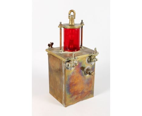 A SHIP'S BRASS LAMP of square design with red lights. 16.5ins high.