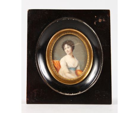 A GOOD 19th CENTURY OVAL PORTRAIT MINIATURE OF A YOUNG LADY sitting on a chair. 5.5cms x 4.5cms in a gilt and wooden frame.