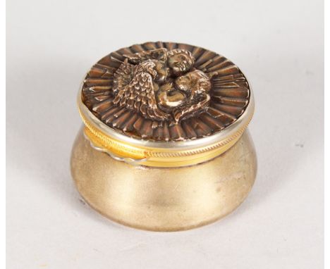 A BUCCELLATI .925 SILVER PATCH BOX, the lid with engraving and mirro. 4.5cms.