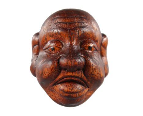 A CHINESE CARVED WOOD NETSUKE, Mask.