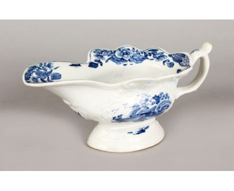 A WORCESTER SAUCE BOAT painted with the triangular platform pattern, circa 1755.