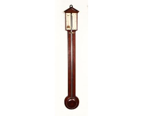 A 19th CENTURY MAHOGANY STICK BAROMETER with arch pediment and ivory thermometer and barometer. 2ft 10ins high.