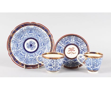 AN 18TH CENTURY WORCESTER PEDESTAL COFFEE CUP, TEACUP, SAUCER AND SIDE PLATE, painted with the So-called Royal Lily pattern a
