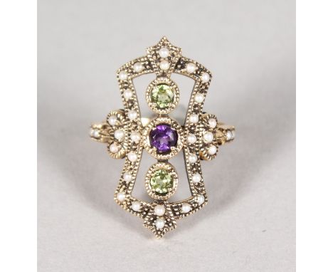 A 9CT GOLD AMETHYST, PERIDOT AND PEARL RING.