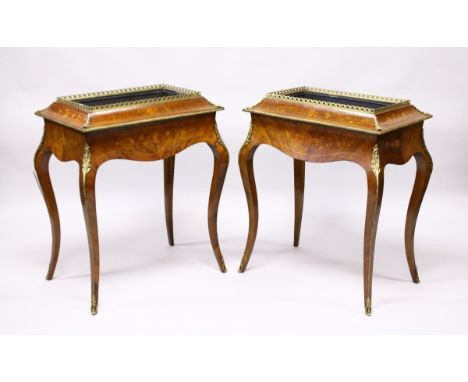 A PAIR OF 19TH CENTURY FRENCH KINGWOOD AND MARQUETRY RECTANGULAR PLANTER, with tin liners, ormolu mounts, on slender curving 