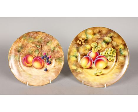 A ROYAL WORCESTER PLATE painted with fruit by John Smith, signed Smith 1950 - 1971 and another plate painted with fruit by Fr