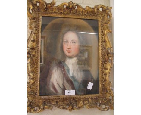 Portrait of a gentleman in a gilt frame, pastel, together with two framed watercolours of crests (3)  