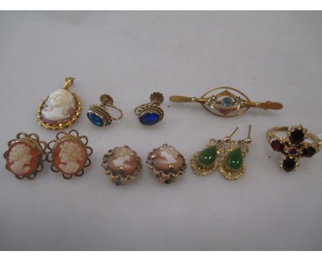 A 9ct garnet ring, an Edwardian zircon and diamond bar brooch, two pairs of cameo earrings and a pendant, a pair of opal doub