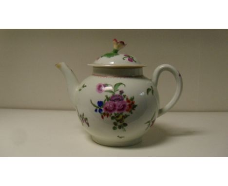 A Worcester tea pot and cover (2)  The flower cover knop and a rim chip have been restored. A chip to the spout has been rest