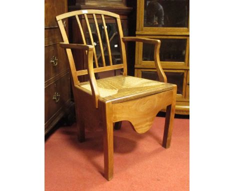A Victorian mahogany tilt top occasional table and a late Victorian rush seated commode chair  