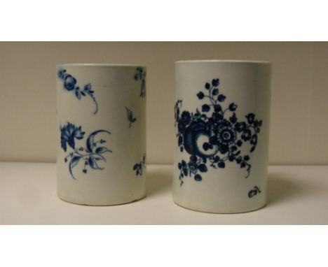 Two Worcester blue and white mugs, 12cm (4.75 in) high (2)  The painted mug has a crack through the upper terminal of the han
