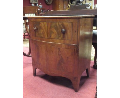 A mahogany bow front table  
