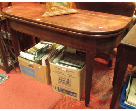 A George III mahogany foldover top D shape side table  