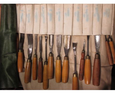 65 hand-forged carving chisels; and approximately 40 various woodworking tools  