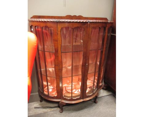 A 1930's walnut bow fronted display cabinet, 118 x 104 x 41cm  